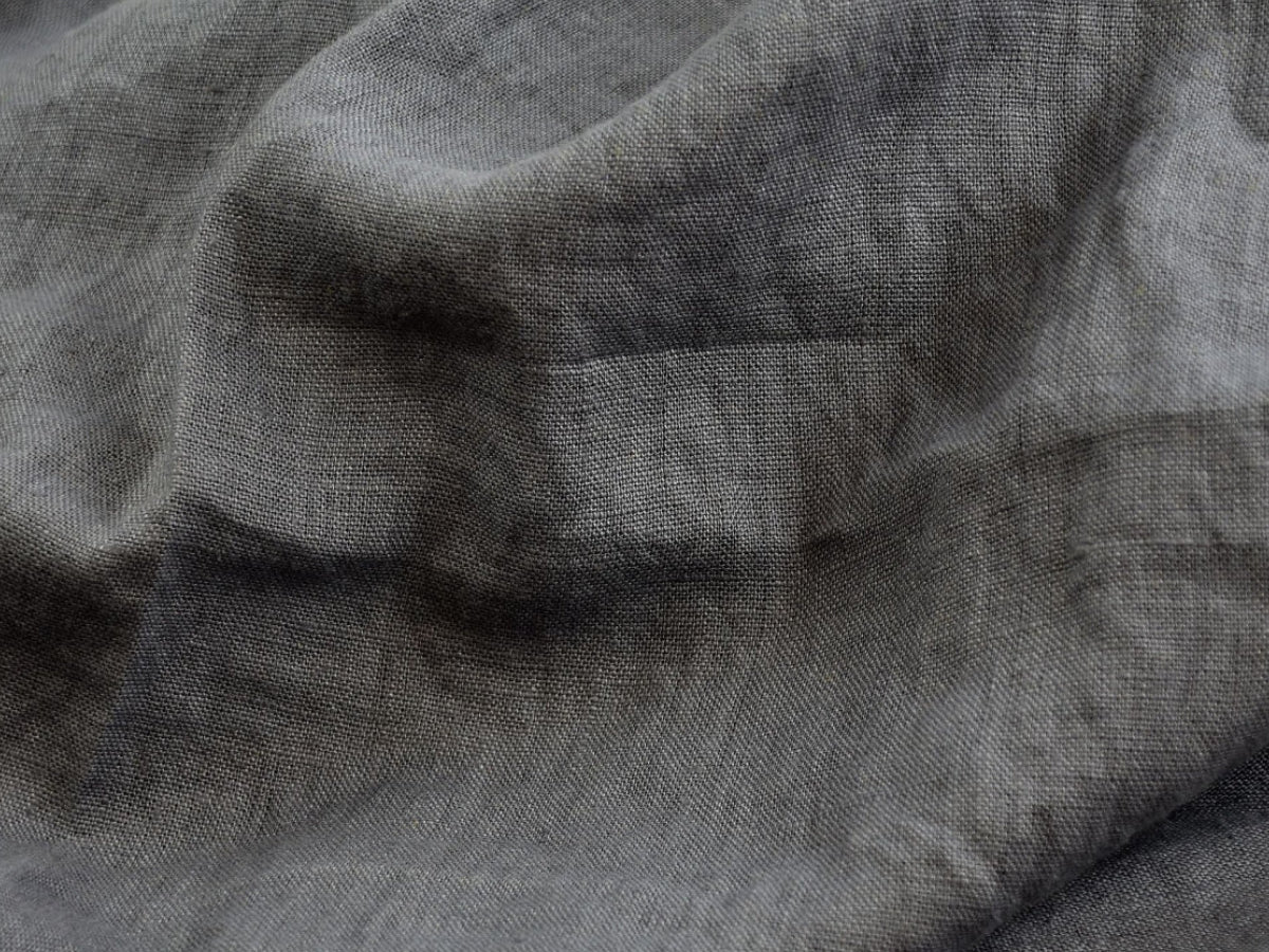 Close-up of gray fabric with a textured pattern