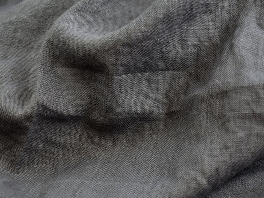 Close-up of gray fabric with a textured pattern