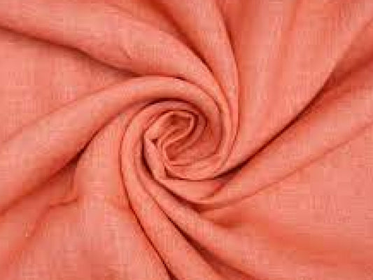 Close-up of pink fabric with a swirl pattern