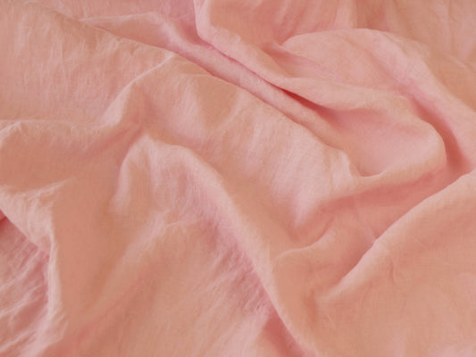 Close-up of pink fabric with ruffled texture